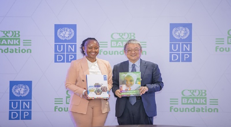  UNDP country Resident Representative Shigeki Komatsubara (R) and CRDB Bank Foundation managing director Tully Esther Mwambapa. 