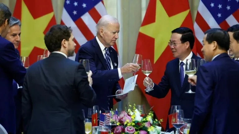US President Joe Biden raises a toast with Vietnamese President Vo Van Thuong in Hanoi, Vietnam, on September 11, 2023