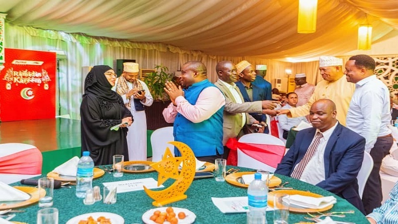 Puma Energy Tanzania director Fatma Abdallah (L) speaks with various stakeholders after iftar the firm hosted in in Dar es Salaam on Sunday.