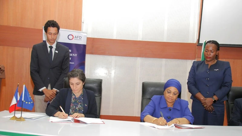 Finance ministry permanent secretary Dr Natu El-Maamry Mwamba  (R) and French Development Agency country director Celine Robert pictured in Dodoma city yesterday 