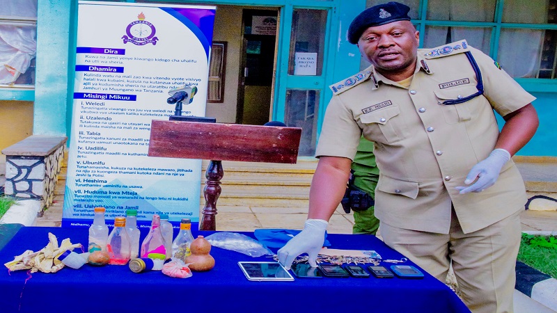 ACP Kennedy Mgani, the acting Shinyanga regional police commander, shows to journalists in the region yesterday the various stolen items including mobile phones, 320 litres of diesel and cannabis which they seized during a three weeks operation from March