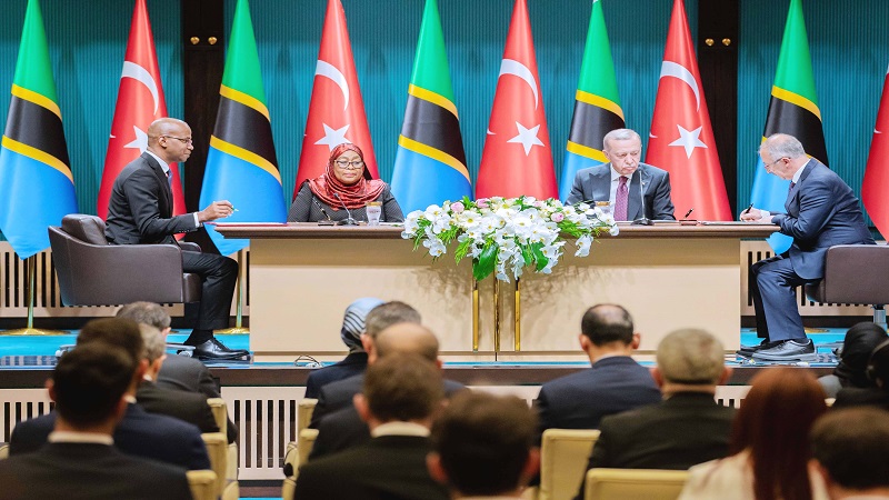 President Samia Suluhu Hassan with the Turkey President Recep Tayyip Erdogan witnessing while the Minister for Foreign Affairs and East African Cooperation January Makamba (L) 