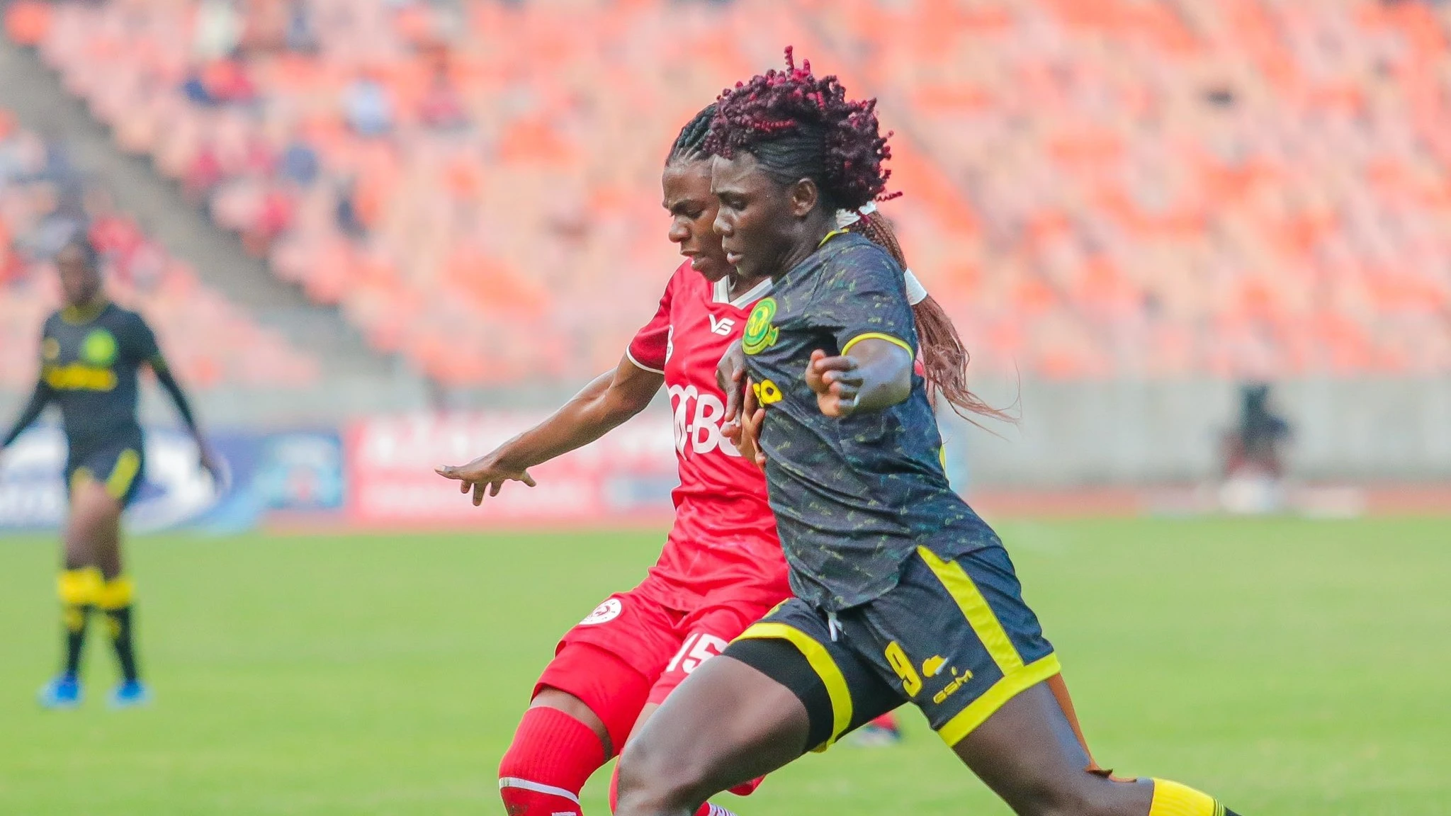 Yanga Princess' Nigerian forward, Blessing Nkor (R), negotiates her way past Simba Queens' left-back Diana William when the two outfits took on each other in the previous season's Serengeti Lite Women's Premier League (SWPL) 