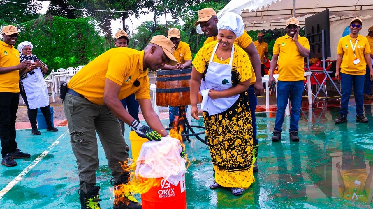 Mohamed Mwaimu, Emergency Response Team (ERT) Supervisor at Geita Gold Mining Limited, is pictured at the 2024 OSHA exhibitions in Arusha giving a demonstration on how best to safely extinguish a fire using household items._