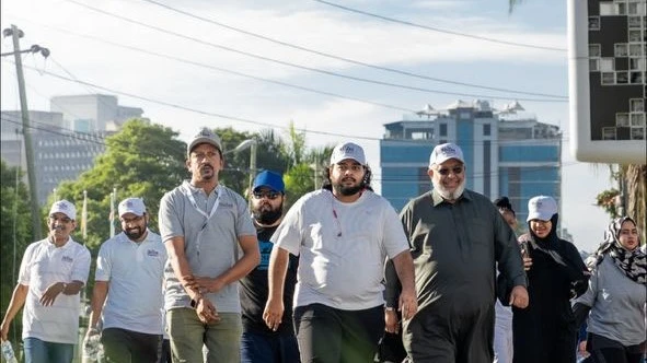 Managing Director of Shifaa Pan African Hospitals, Bashir Haroon (R) and Radiographer, Shaikh Nasrudin (L) participated in a 4.2 km walk to celebrate World Women Wellness Day 2024 and the opening of the hospital in Dar es Salaam. 