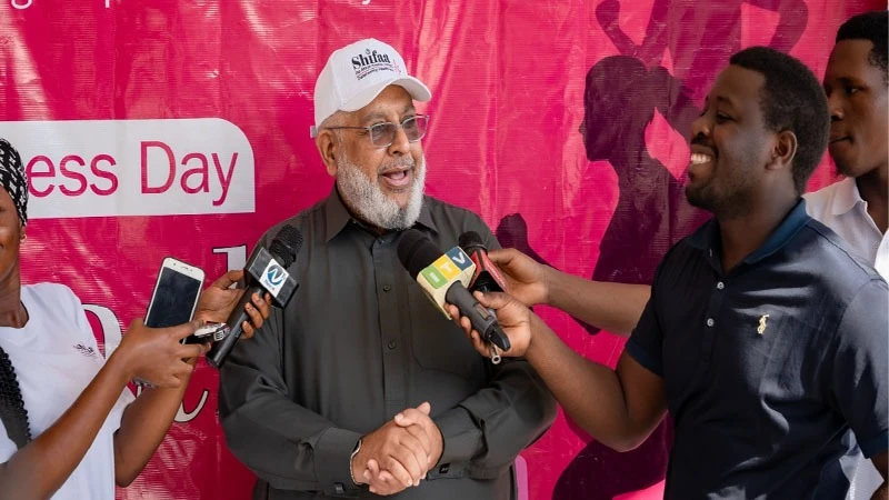 Bashir Haroon, (C) Shifaa Pan African Hospitals Limited Managing Director briefing journalists after a 4.2 walkathon which took place in Dar es Salaam over the weekend as the commemoration of World Women Wellness Day.