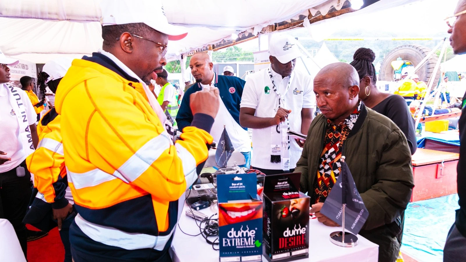 GGML's occupational health specialist, Dr Cretus Karwan screening one of the citizens who visited the GGML booth and was offered health screening services at the GGML pavilion at the 2024 OSHA exhibition in Arusha, which coincides with World Health.