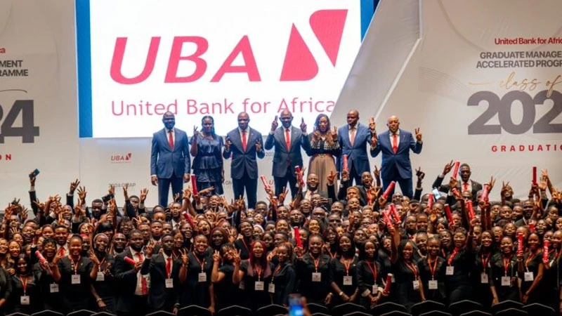  

Tony Elumelu, group chairman of United Bank for Africa (centre standing) with 398 young Africans who were inducted after participating in a six-month graduate management accelerator programme (GMAP) recently.