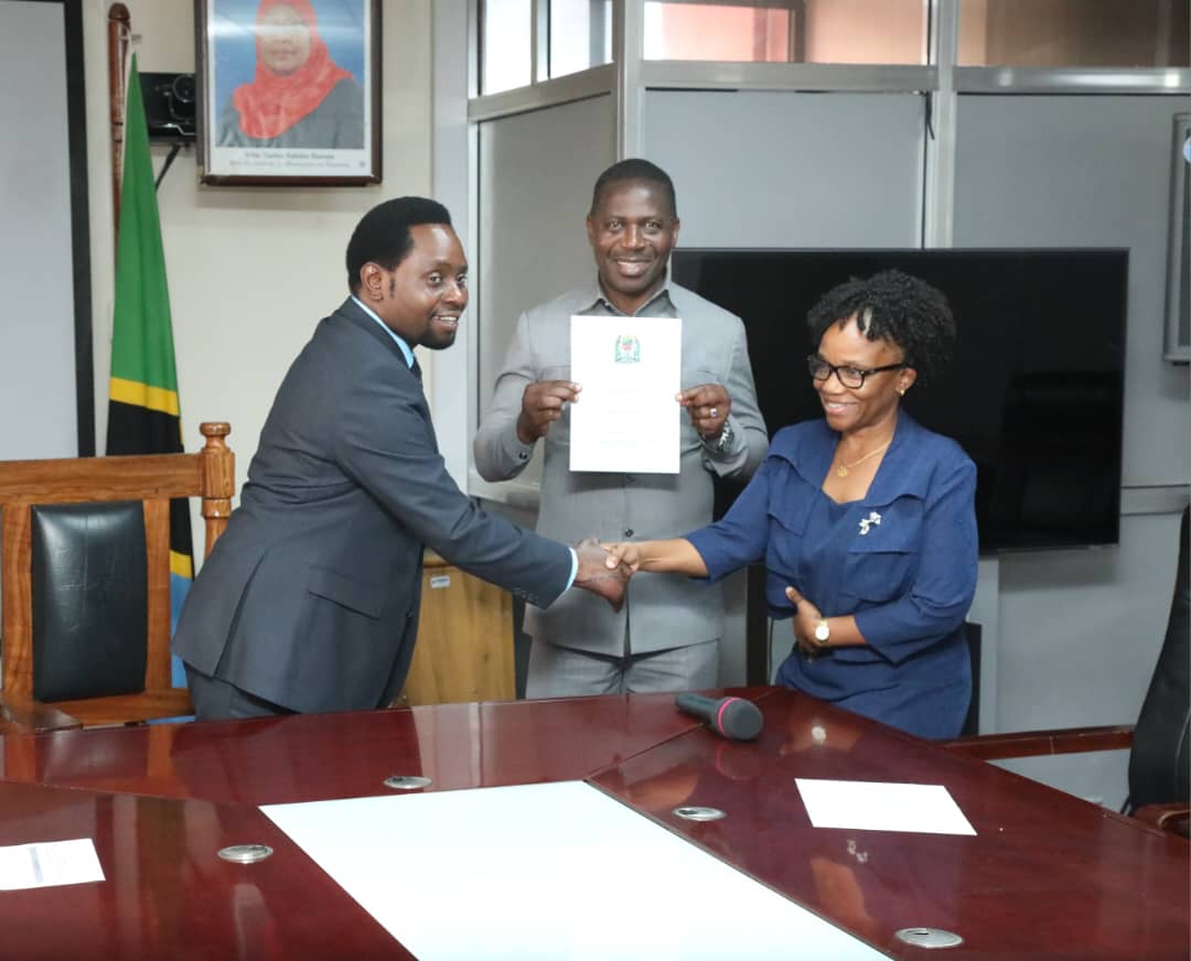 Regional administrative secretaries from five regions implementing the United States Agency for International Development (USAID) nutrition project, namely Kigoma, Katavi, Rukwa, Songwe and Njombe posing with Dr. Festo Dugange.