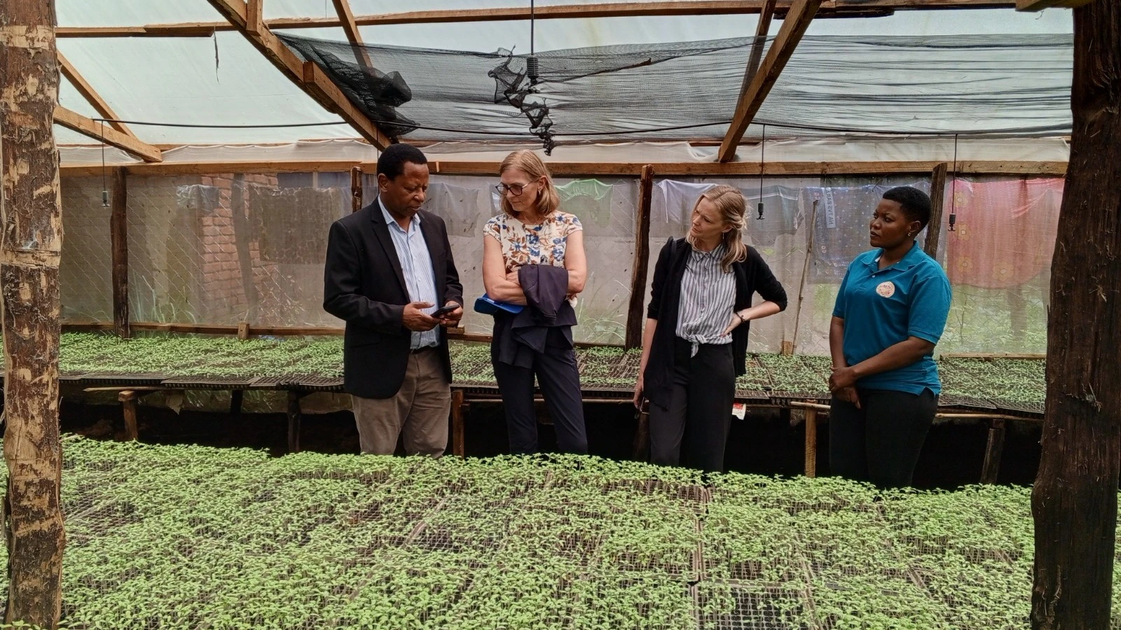 Standing together at Raha Farm in Dumila Juu, Kilosa District Council, Morogoro (right to left) are Tone Tinnes, Norwegian Ambassador to Tanzania; Godfrey Kirenga, SAGCOT CEO; Guro Glavian, First Secretary, Agriculture, Climate Change and Environment.