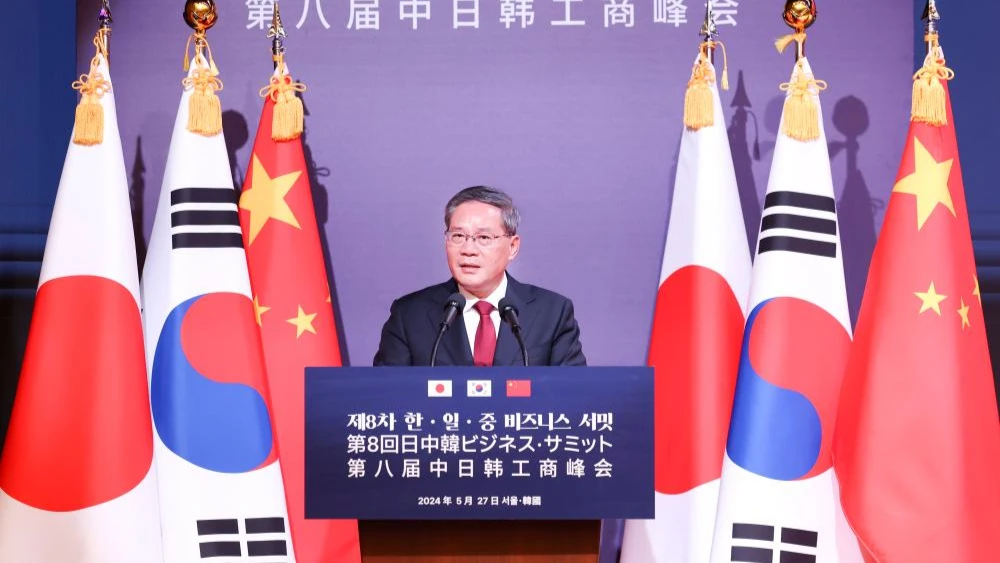 Chinese Premier Li Qiang speaks at the eighth business summit among China, Japan and South Korea, in Seoul, South Korea, May 27, 2024. Li attended the business summit with South Korean President Yoon Suk-yeol and Japanese Prime Minister Fumio Kishida.