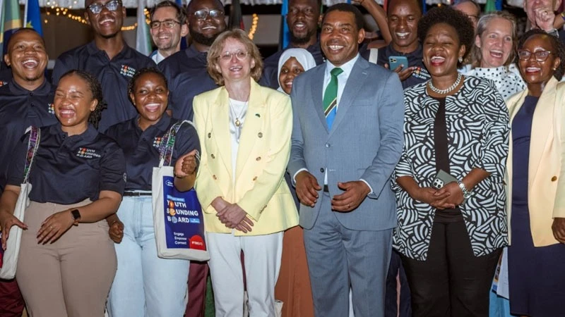 
Christine Grau, EU Ambassador to Tanzania (3rd L- front row) and Finance Minister Dr Mwingulu Nchemba (left to the ambassador) pose in a group photo with members of Youth Sounding Board (YSB). 