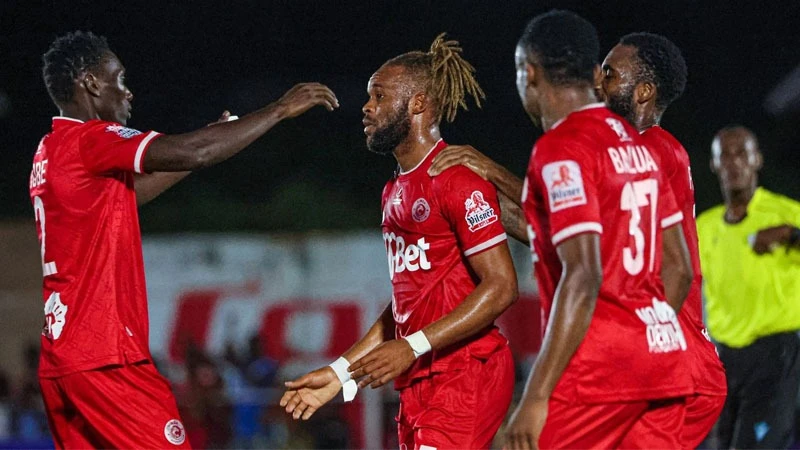 Simba SC players celebrate after scoring a goal against Namungo at Majaliwa Stadium in Lindi on Tuesday, April 30. The match ended in a 2-2 draw, dealing a blow to Simba's hopes of qualifying for the CAF Champions League next season.