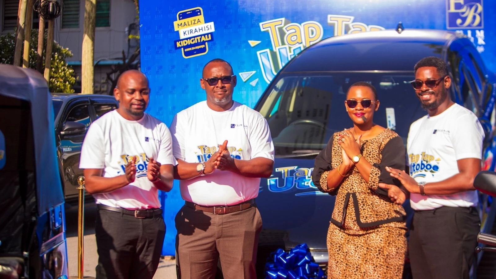 Stanley Kafu, Exim Bank’s Head of Marketing & Communications (right), a representative from the Tanzania Gaming Board, Lucy Obadia Katamba (middle), Andrew Lyimo, Head of Retail Banking (second from left), and Silas Matoi, Head of Alternative Channels..