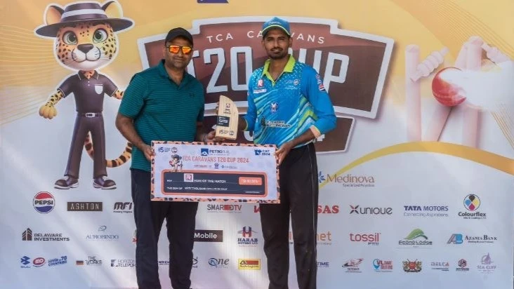 
Delaware Upanga SC's Maker Mukesh (R) receives the Ras Logistics Man of the Match award from Basit Raza of Harab Motors upon culmination of the 2024 Petrofuel TCA Caravans T20 Cup tie pitting the squad against Balakrishna Foundation Aces last weekend.