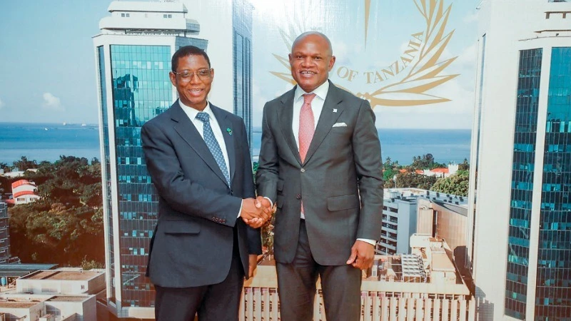Bank of Tanzania (BoT) Governor Emmanuel Tutuba welcomes to his office Access Bank Plc Executive Director (ED, African Subsidiaries) Oluseyi Kumapayi when the later paid a working visit to Bank of Tanzania offices in Dar es Salaam at the end of the week. 