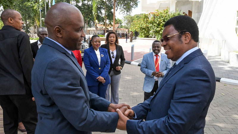 Prime Minister Kassim Majaliwa (R) greets the Kigamboni Member of Parliament and the candidate for the position of Director of the World Health Organization African Region, Dr Faustine Ndugulile when they met at the Parliament grounds, Dodoma, yesterday. 