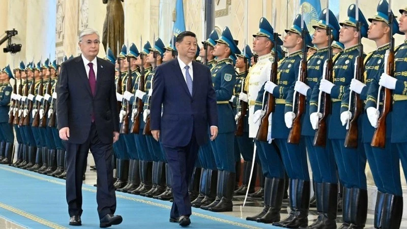 Chinese President Xi Jinping and Kazakh President Kassym-Jomart Tokayev inspect the guard of honor in Astana, Kazakhstan, July 3, 2024.