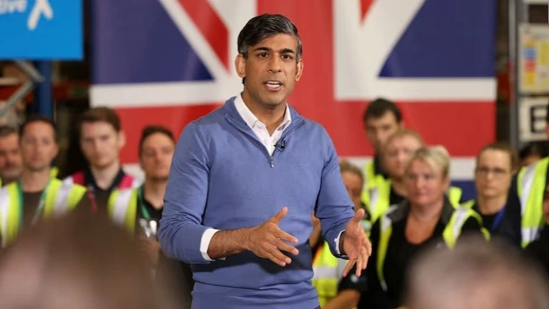 British Prime Minister Rishi Sunak holds a speech during his visit to the Well Healthcare Supplies as he campaigns in the Midlands, in Stoke, Britain, July 1, 2024.