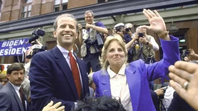 Joe Biden standing with his wife Jill in 1987