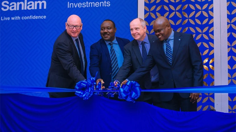 Robert Dommisse, (R)Chief Executive:Life Insurance at SanlamAllianz, Jonathan Stichbury, (2 ND-R)  Sanlam Investments East Africa Limited Managing Director and CEO, Nicodemus Mkama, ((2 ND-L) Capital Markets and Securities Authority CEO pictured in DSM.