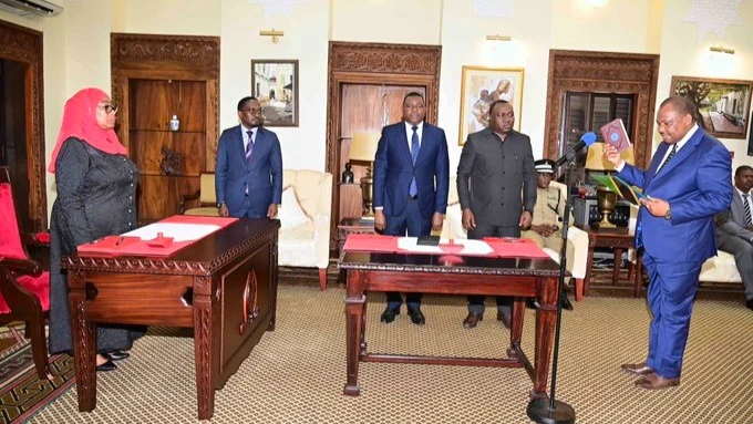 President Samia Suluhu Hassan swearing in Suleiman Mombo as the Director General of the Tanzania Intelligence and Security Services (TISS).