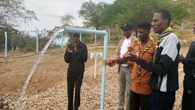 Geoffrey Mnzava (2nd-R), leader of the ongoing 2024 edition of the cross-country Uhuru Torch Race, pictured on Thursday gracing the launch of the 422m/- Bwagamoyo Kibaya water project in Kiteto District 