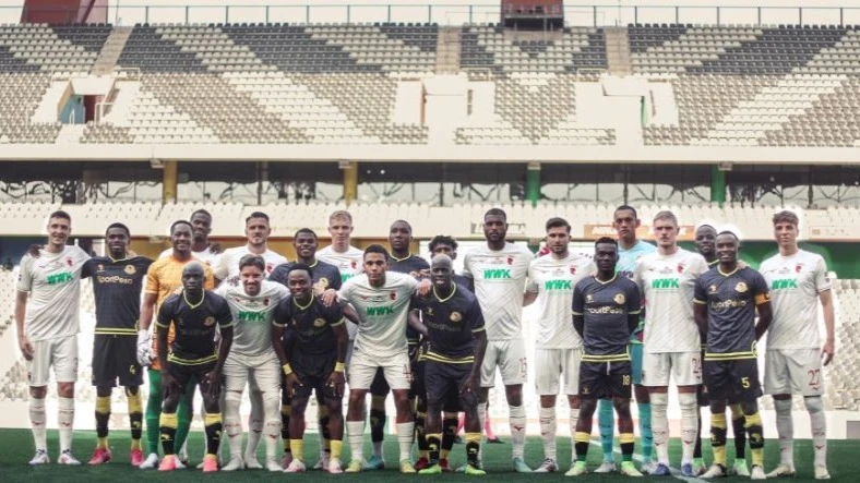 Young Africans and FC Augsburg players pictured in a group photo during their friendly match at Mbombela Stadium in Mpumalanga Province, South Africa on Saturday afternoon.
