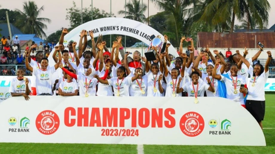 
Tanzania Women’s Premier League champions Simba Queens’ players celebrate with their trophy after their final match against Geita Gold Queens held at Azam Complex in Dar es Salaam in June this year. 
