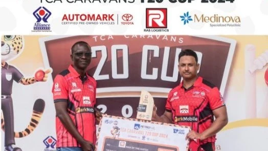 Park Mobile Lions outfit's Mohamad Jawed (R) is pictured getting the Ras Logistics Man of the Match prize from Park Mobile's CEO, Andrew Muga, after the completion of the 2024 Petrofuel TCA Caravans T20 Cup's third-place duel between the squad-Balakrishna