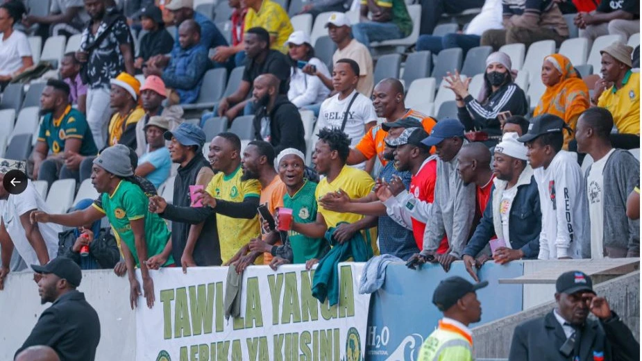 Young Africans fans in South African pictured during their international friendly match against the Bundesliga side FC Augsburg at Mbombela Stadium in Mpumalanga Province, South Africa over the weekend.