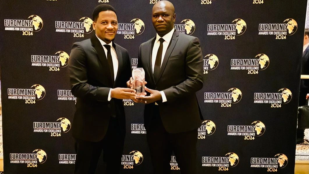 Director of retail Banking, CRDB Bank Bonaventura Paul (R ) and the bank’s head of business banking Toyi Ruvumbagu (L)hold the Tanzania Best SMEs Bank award issued by the UK based Euromoney Magazine during the awards ceremony held in London recently.