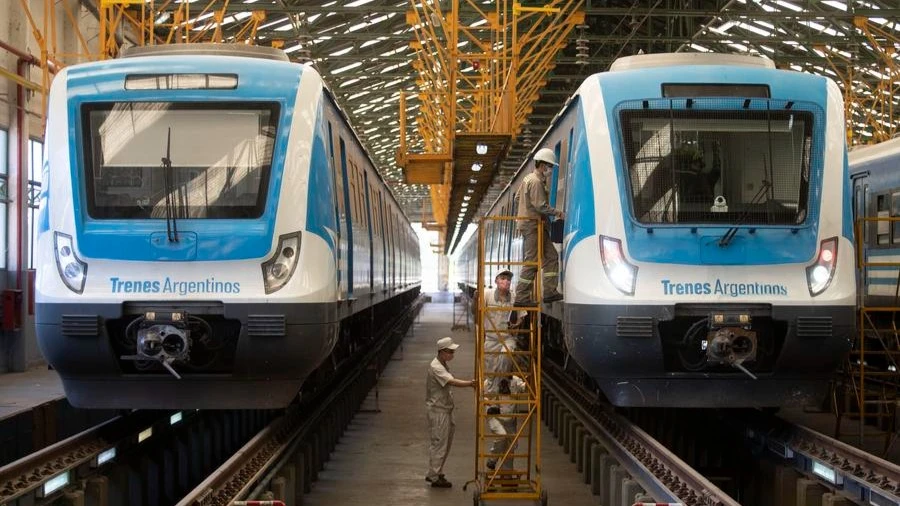 Chinese engineers and technicians with CRRC Qingdao Sifang Co., Ltd., together with their Argentine colleagues, inspect a train in Llavallol, some 33 km south of Buenos Aires, Argentina, Nov. 16, 2020. 