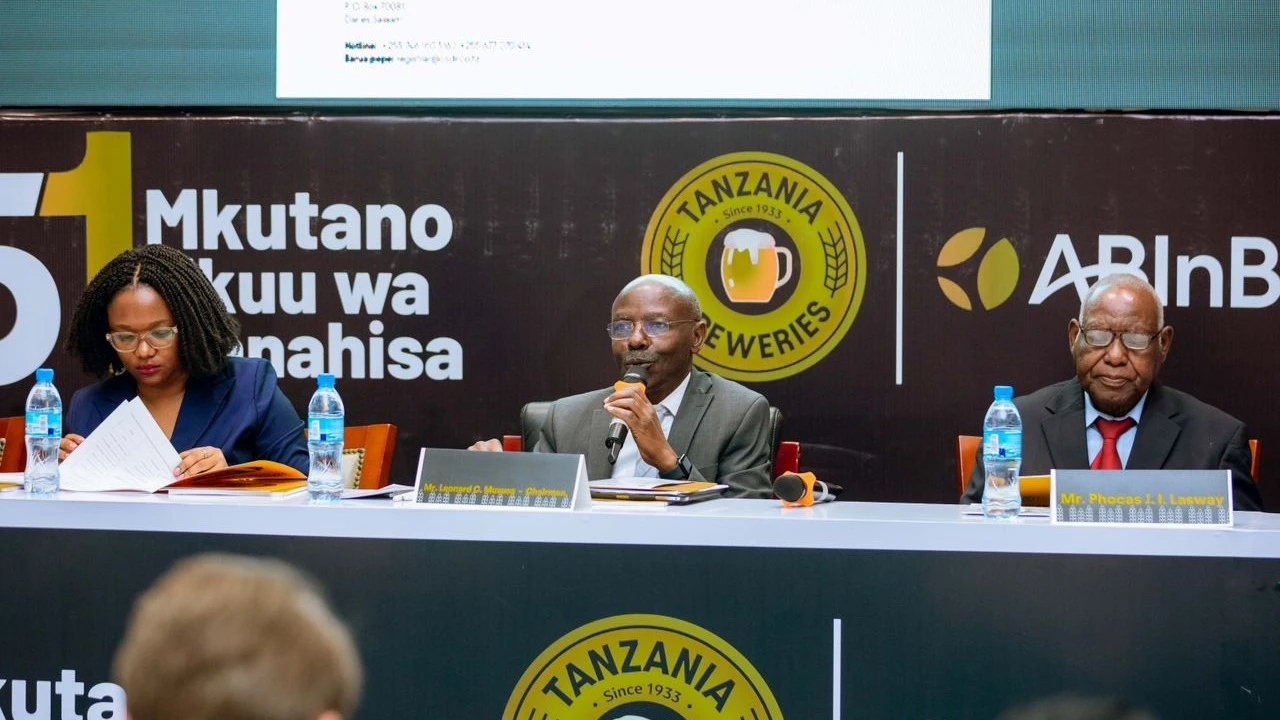 TBL Board Chairman Leonard Mususa addresses shareholders during the 51st Annual General Meeting (AGM) held at the Julius Nyerere International Convention Centre in Dar es Salaam yesterday.