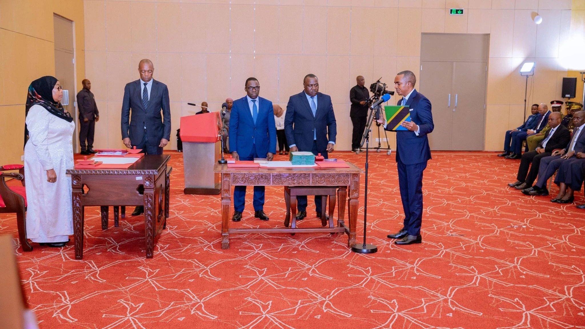 President Samia Suluhu Hassan swears in Jerry William Silaa (42) as Information, Communications and Information Technology minister at State House in Dar es Salaam yesterday. 