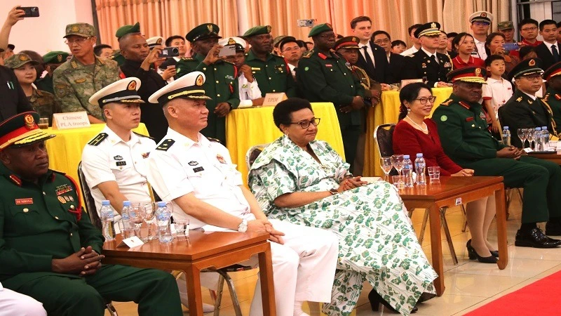 Defence and National Service minister Dr Stergomena Tax (C, seated) pictured in Dar es Salaam at the weekend following proceedings at celebrations marking the 97th anniversary of the founding of the Chinese People’s Army.