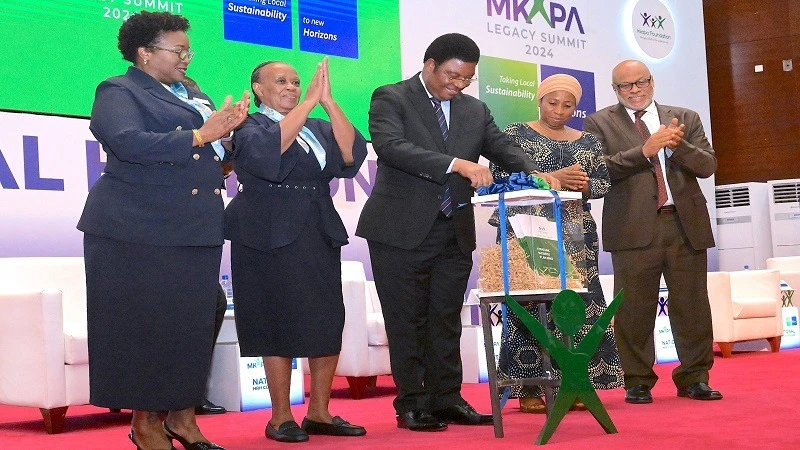 Prime Minister Kassim Majaliwa (C)launching Mkapa Foundation the strategic business plan brief.