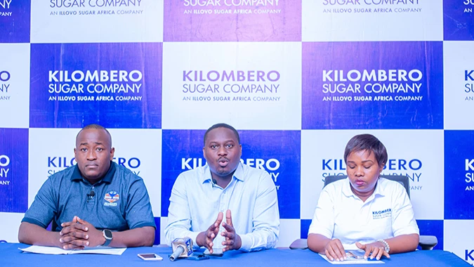 Corporate Affairs Director at Kilombero Sugar Company,Derick Stanley (centre) addresses a media conference in Kilombero yesterday where he spoke about the Company's efforts in nearing the completion of its K4 factory expansion. 