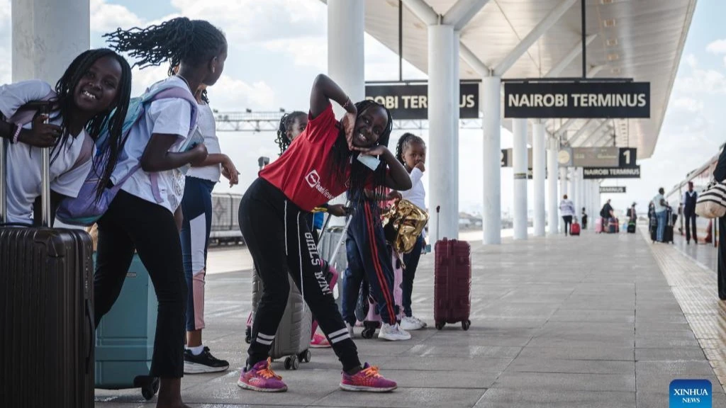 Children wait to board a train of the Mombasa-Nairobi Standard Gauge Railway in Nairobi, Kenya, in October 2023. 