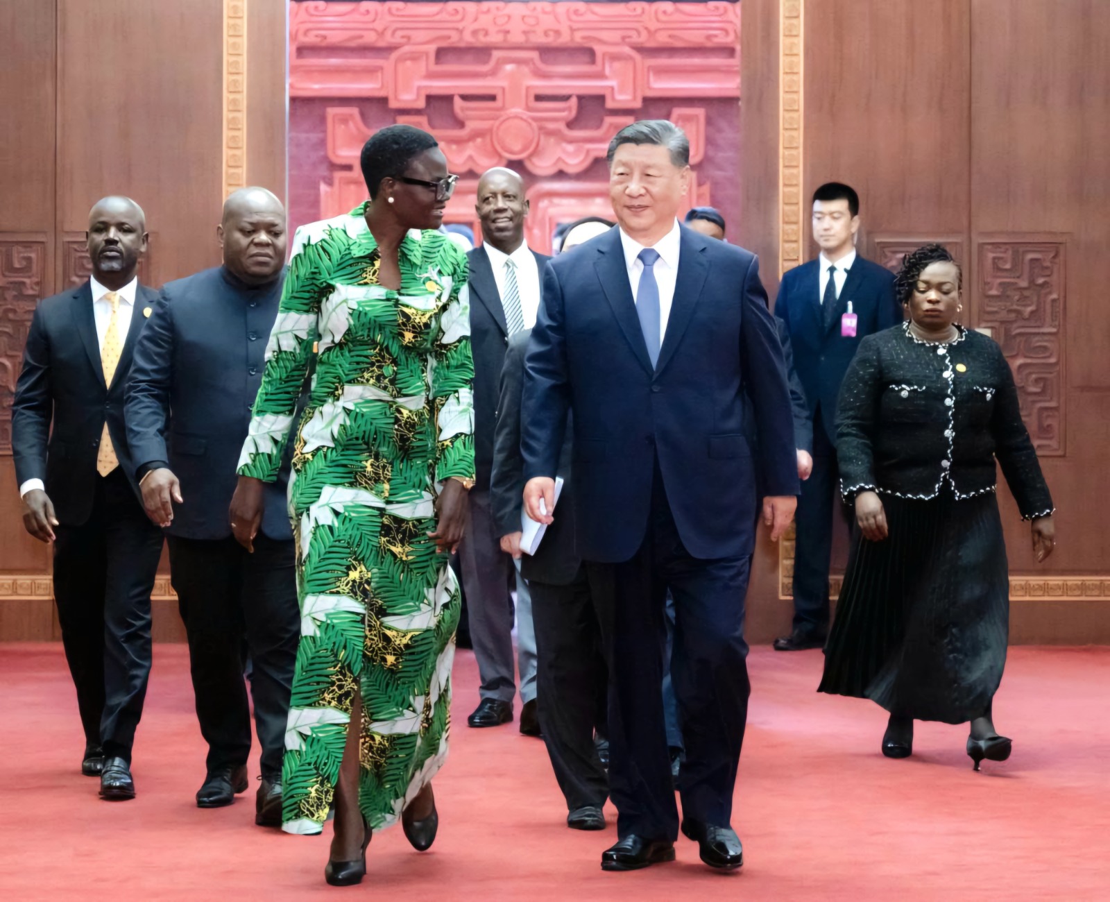 Dr Tulia Ackson (L), president of the Inter Parliamentary Union and Speaker of the National Assembly, speaks with Chinese President Xi Jinping (R) at the State House in Beijing on Tuesday. 