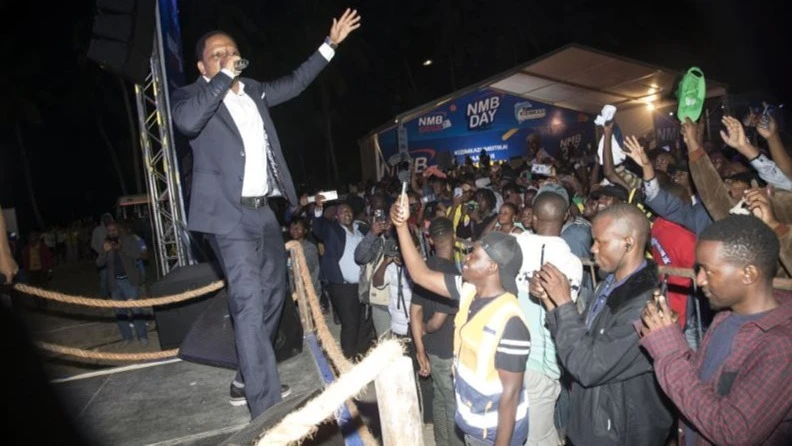 Deputy Minister for Culture, Arts, and Sports, Hamis Mwinjuma, also known as Mwana FA, performs during the NMB Day Singeli Night at the Kizimkazi festival.