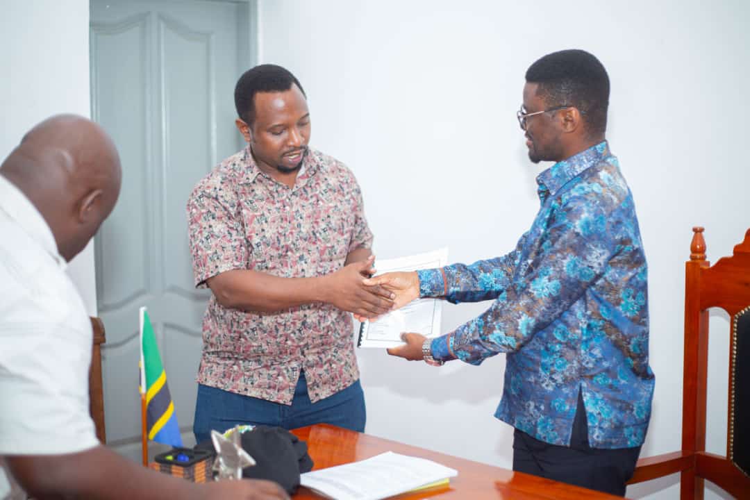 Outgoing Lushoto district commissioner Japhari Kubecha (R) hands the office to his successor, Zephania Sumaye, at the Lushoto District Council offices earlier this week. 