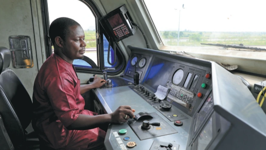 
A train driver prepares for departure at Idu Railway Station, the starting point of the Abuja-Kaduna Railway in Abuja, the capital of Nigeria.