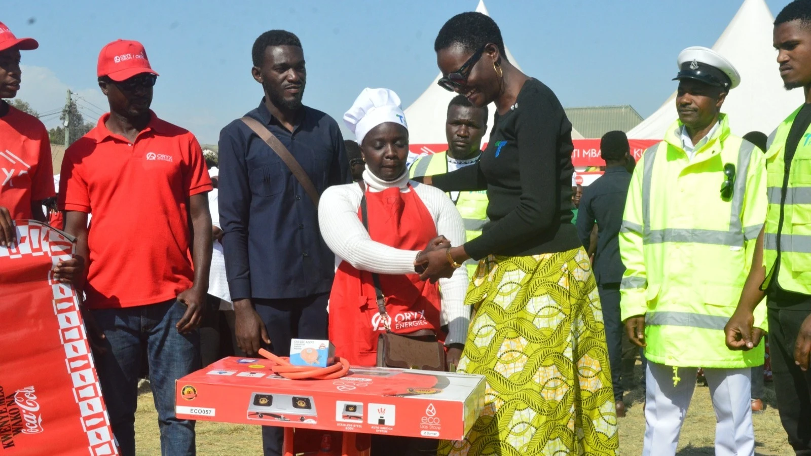 Speaker of the National Assembly, Dr Tulia Ackson (right), congratulates one of the cooking competition participants, Zuwena Kibula. The event involved 1,000 food vendors in Mbeya Region.