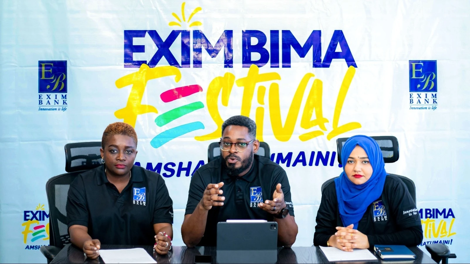 Stanley Kafu (center), Head of Marketing and Communications at Exim Bank Tanzania, addresses the media during the announcement of the upcoming Exim Bima Festival 2024, themed 'Amsha Matumaini'. 