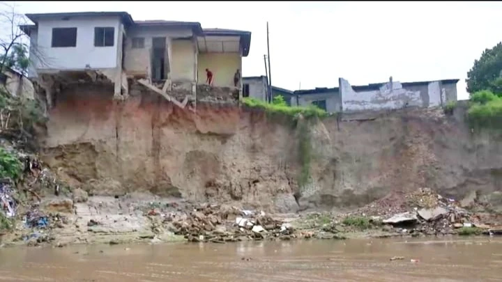 Residential houses along the Tegeta River were washed out by rain water. 