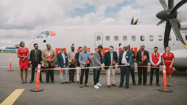 The CEO of Flightlink Limited Mr. Munawer Dhirani and DTB Tanzania CEO, Mr. Ravneet Chowdhury [center] during the unveiling ceremony of the 72-seater ATR 500 aircraft over the weekend. Other officials present at the function are Chief Operating Officer.