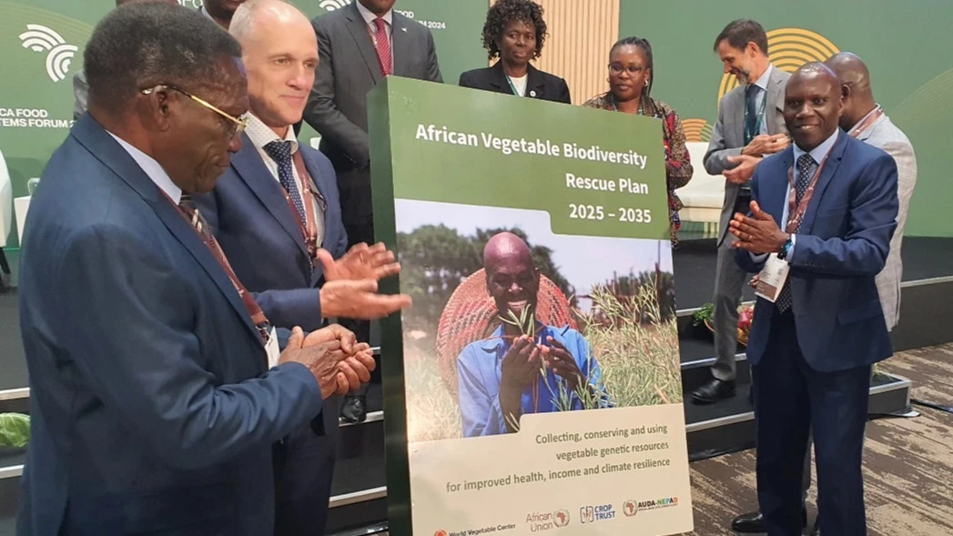 The retired Prime Minister Mizengo Pinda (L), chairman of the President Food and Agriculture Delivery Council, alongside Dr. Marco Wopereis (2nd L), director general of the World Vegetable Center, and Dr. Gabriel Rugalema ( R)