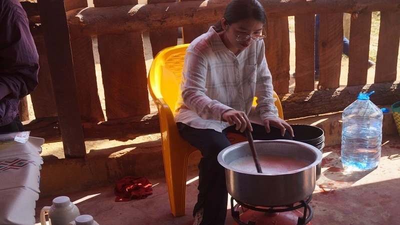 
A Chinese expert Xu Jin stirring the boiling of soy bean milk at Mtego wa Simba training centre in Mikese ward, Morogoro Region.