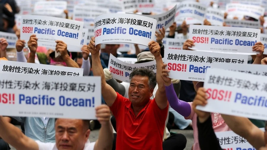 People rally to protest against Japan's planned discharge of nuclear-contaminated water in Seoul, South Korea, June 12, 2023.